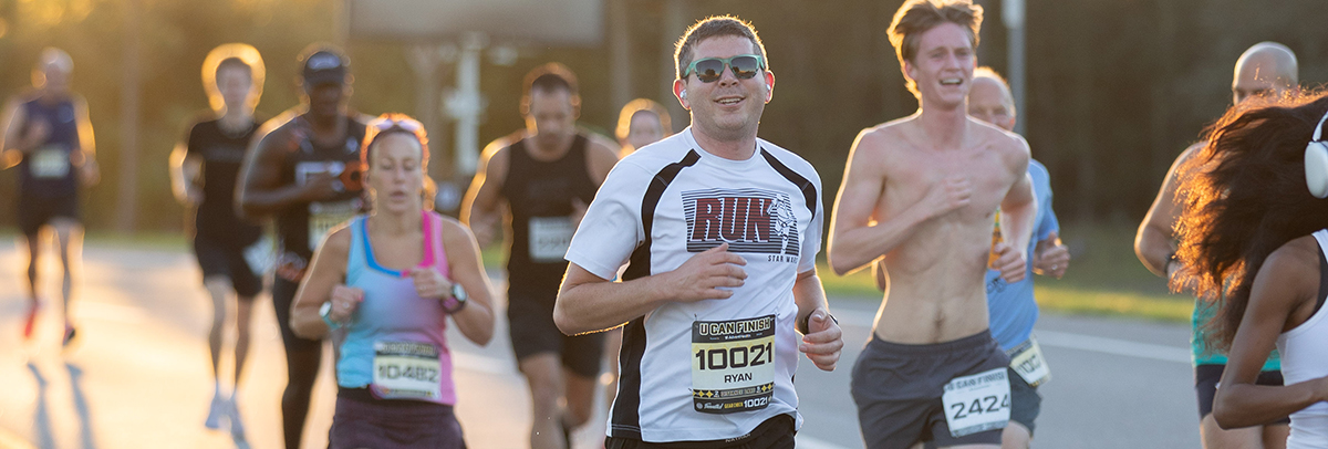 Happy Fanatic running at U Can Finish 5 Mile & 2 Mile