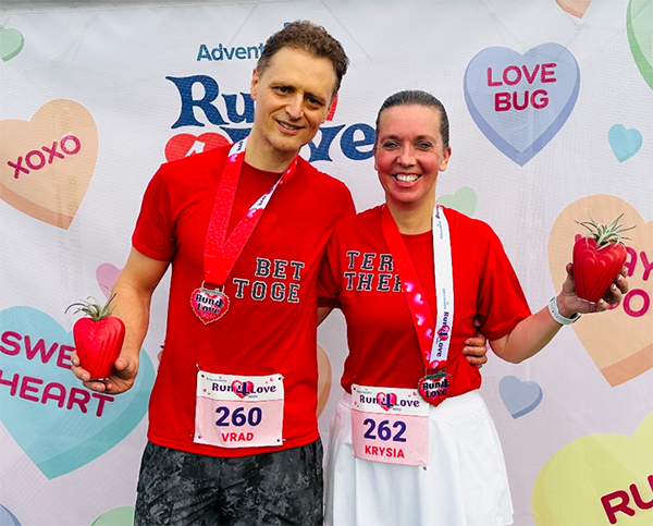 Couple wearing matching red shirts at Run 4 Love